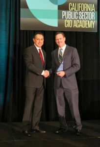 Tim Dupuis receiving CIO of the Year award